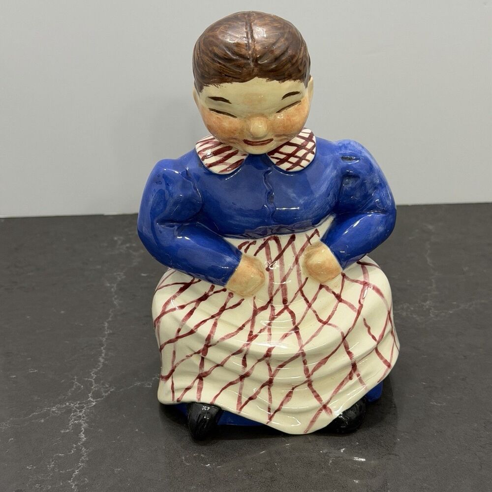 Vintage Dutch Girl Ceramic Figurine Hand Painted Blue Red Plaid Seated 1940’s